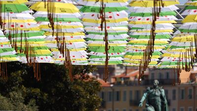 Umbrellas with the colours of the Tour de France leader's jersey in Nice on Wednesday, August 26. The 2020 racestarts in Nice on August 29 and runs to September 20. AFP