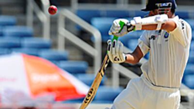 Rahul Dravid, nicknamed The Wall, keeps out a delivery during his 112-run century in Jamaica.