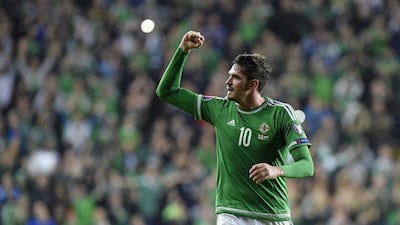 Northern Ireland's striker Kyle Lafferty celebrates after scoring their late equaliser in a 1-1 Euro 2016 qualifying draw against Hungary on Monday. Michael Cooper / AFP / September 7, 2015