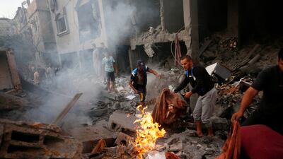 The aftermath of an Israeli air strike in the central Gaza Strip. Some Palestinians are now returning to their homes in the north of the enclave. AFP