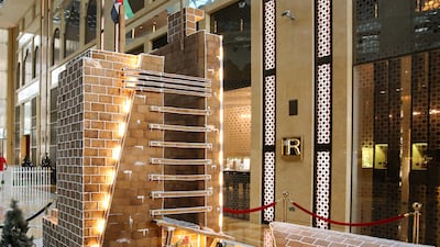 The H Dubai in gingerbread, complete with nutcracker figurines at the base.