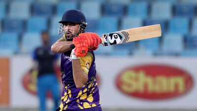 Fujairah's Luqman Hazrat bats during the game