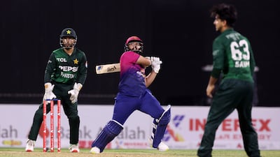UAE's Alishan Sharafu during the recent tri-series match against Pakistan at the Sharjah Cricket Stadium. Chris Whiteoak / The National