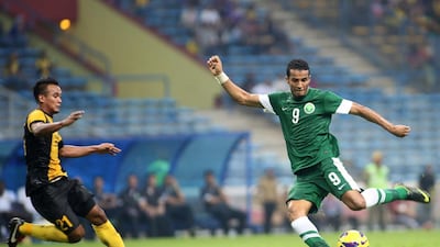 Saudi Arabia's Naif Hazazi got on the scoresheet during the 10-0 win over East Timor. Kamarul Akhir / AFP