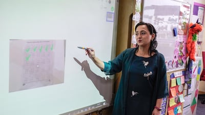 Private schools in UAE gear up for for remote learning and challenges they will face. Teacher Taira Astab during an online lecture at the Al Yasmina Academy. Victor Besa / The National