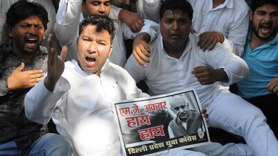 Congress party workers in New Delhi protest against MJ Akbar's alleged sexual misconduct and harassment of journalist. EPA