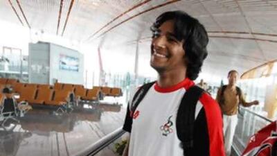 The UAE sailing Olympian Adel Khaled Abdulghafar is all smiles after arriving at the Beijing International Airport ahead of the Games.