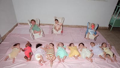 Babies found on the streets of Beirut's Muslim sector by the Lebanese Islamic Orphanage service during the civil war are seen here at a west Beirut orphanage in 1987. Rabih Moghrabi / AFP