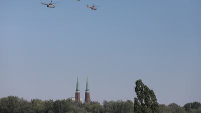 Polish Air Force helicopters fly over Warsaw. EPA