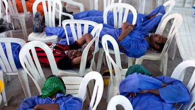 Workers take a break from the hot UAE sun. Based on the Thermal Work Limit this is required if a reading of 115 or lower is recorded.