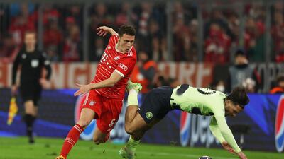 Manchester City's Jack Grealish tangles with Bayern Munich's Benjamin Pavard. Reuters