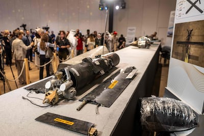 Pieces of missiles and drones recovered after Iran’s strikes are displayed during a press briefing by the UAE government held in Abu Dhabi on March 3, 2026. AFP