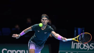 Rafael Nadal returns against Dominic Thiem. AFP