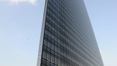 The chief executive of the largest advertising agency, Dentsu, whose headquarters are pictured, has resigned over the death of an employee through overwork. Everett Kennedy Brown / EPA