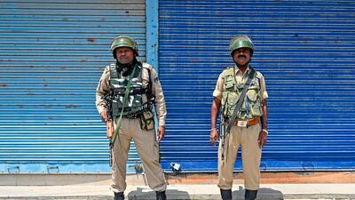 Indian troops stand guard in Srinagar, the main city the Kashmir region, on August 4, 2019. AFP