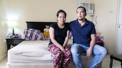 Rollie Tindugan, pictured with his wife Rhodora, owes about Dh8,000 in immigration fines. Reem Mohammed / The National