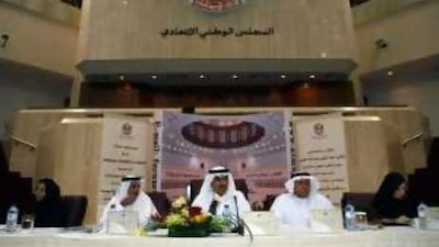 Abdul Aziz al Ghurair (centre), Speaker of the Federal National Council, Mohammed al Mazrouei (left), the council's secretary general, and Obaid al Muhairi, an FNC member from Sharjah, take questions during a press conference yesterday.