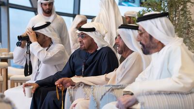 Sheikh Mohamed with Sheikh Hamdan bin Zayed, Ruler’s Representative in Al Dhafra Region, Sheikh Suroor bin Mohamed and Sheikh Tahnoon bin Mohamed, Ruler's Representative in Al Ain Region, watch the final race. Hamad Al Kaabi / Presidential Court
