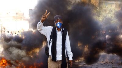 A Sudanese protester in a street demonstration, which have been taking place almost daily since the military coup. Reuters