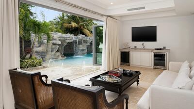 The pool grotto has caves and waterfalls. Courtesy Sotheby’s International Realty