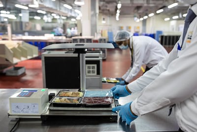 Etihad is turning to technology to reduce food waste on flights. Photo: Etihad