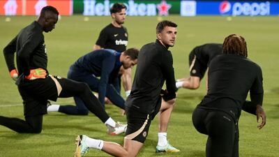 Chelsea midfielder stretches alongside teammates during a training session at the Maksimir Stadium in Zagreb on September 5, 2022, on the eve of their Uefa Champions League Group E match against Dinamo Zagreb. AFP