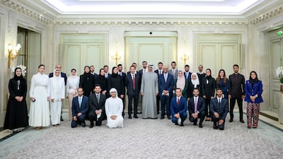 President Sheikh Mohamed and Sheikh Hazza bin Zayed, vice chairman of the Abu Dhabi Executive Council, with Emirati students and doctors studying in France.