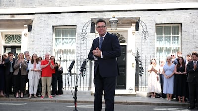 Mr Burnham thanks supporters outside No 10. Reuters