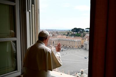 Pope Francis delivers his blessing from the window of the Apostolic Palace on Easter Monday. AFP