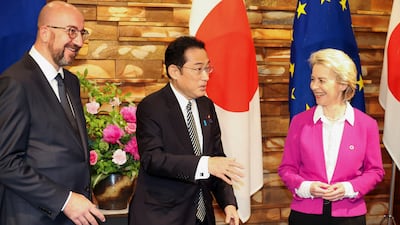 European leaders Charles Michel and Ursula von der Leyen greet Japanese Prime Minister Fumio Kishida in Tokyo, Japan, in May 2022. Reuters