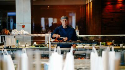 A chef at work in the Roka kitchen