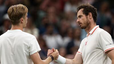 Canada's Denis Shapovalov and Britain's Andy Murray after the match.