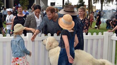 Prince Harry and Meghan meet children from a local community at Victoria Park in Dubbo on October 17, 2018. AFP