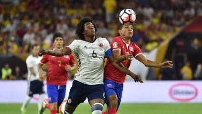 Colombia's Carlos Sanchez, left, and Costa Rica's Johan Venegas vie for the ball during their Copa America match in Houston, Texas, United States, on June 11, 2016. AFP / Nelson ALMEIDA