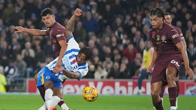 Brighton's Joao Pedro scores against Manchester City. AP