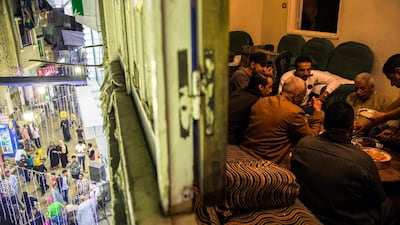 Members of an Egyptian Islamic musical band eat before performing religious songs during celebrations two days ahead of the holy month of Ramadan at al-Baragel, Cairo, Egypt. PA