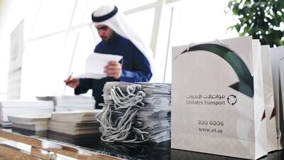 Emirati students who were surveyed said they were more motivated by a culture of respect at the workplace than material rewards. Above, an Emirati fills out applications for employment at a jobs fair in Dubai. Sarah Dea / The National