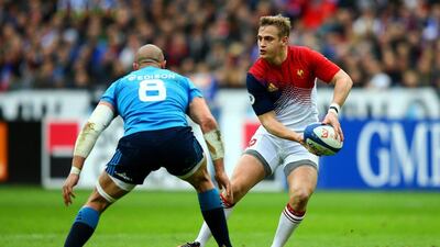 Jules Plisson of France passes the ball under pressure from Sergio Parisse of Italy during the RBS Six Nations match between France and Italy at Stade de France on February 6, 2016 in Paris, France. (Photo by Richard Heathcote/Getty Images)