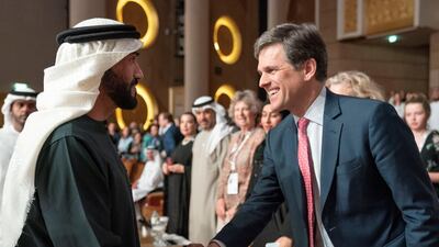 Sheikh Nahyan Bin Zayed greets Timothy Shriver.. Ryan Carter / Ministry of Presidential Affairs