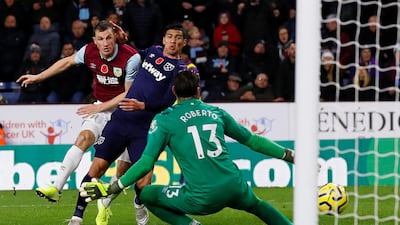 Burnley's Chris Wood takes a shot at Turf Moor. Reuters
