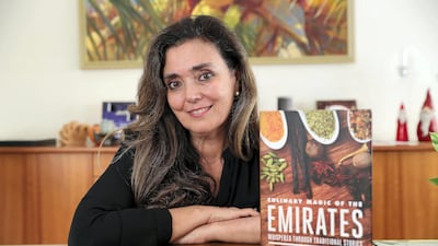 Alexandra Von Hahn with her cookbook ‘Culinary Magic of the Emirates’ at the Meadows in Dubai. Pawan Singh / The National