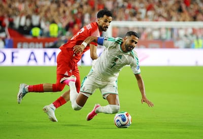 Algeria's Riyad Mahrez, right, in action with Jordan's Mahmoud Almardi. Reuters