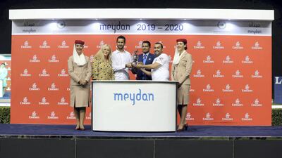 Barack Beach trained, by Satish Seemar - third right - won the Emirates Holidays race on Thursday. Chris Whiteoak / The National