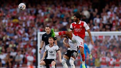 Arsenal's Mohamed Elneny with Fulham's Andreas Pereira. Reuters