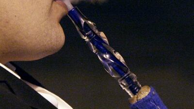 The total value of fines collected from shisha cafes was Dh885,000. Jeffrey E Biteng / The National