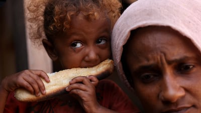 A girl and her mother at a camp for displaced people in the city of Al Khokha, Yemen. Reuters