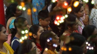 People offer prayers for Diwali at the temple in Bur Dubai.