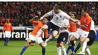 Long used to playing a supporting role, Wayne Rooney finds himself alone at the front for England and Manchester United.
