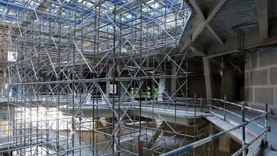 The non-oil economy, including construction, is expected to rebound this year. Pawan Singh / The National