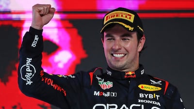 Red Bull's Sergio Perez celebrates on the podium after winning the Saudi Arabia Grand Prix at Jeddah Corniche Circuit on March 19, 2023. Getty